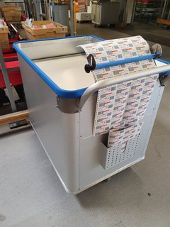 Picking-trolley with spring base, handle and label dispenser