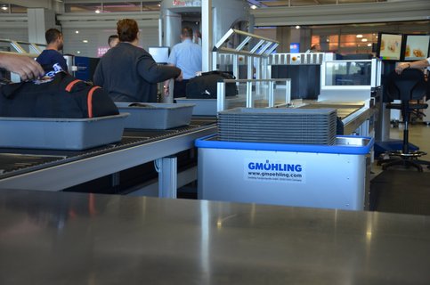 Spring-loaded base trolley at the airport